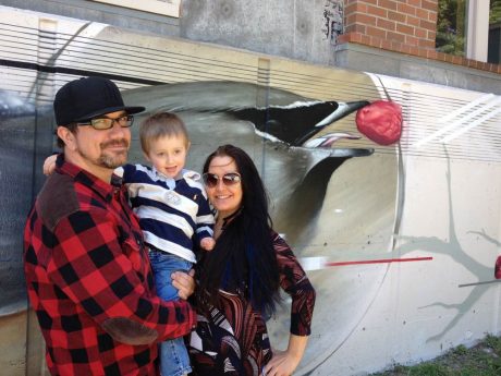 Mural artist Jake Wagoner, his fiancee Jeane Meyersahm, and their son Dylan after the celebration - Louise Dustrude photo