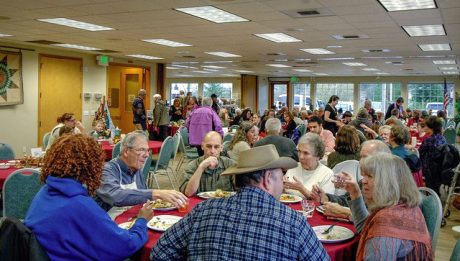 Diners enjoy a feast and good company at the Community Thanksgiving Dinner - Contributed photo