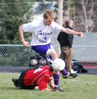 Cam works the ball upfield against Coupeville Saturday.